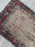 Antique hallway runner, Caucasian tribal rug with a distressed ivory ground, geometric border design, and genuine farmhouse style.
