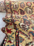 Small antique Caucasian rug with vegetable dyed wool, rare yellow field, tribal folk art design and beautiful age.