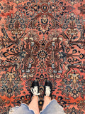 Antique Persian Dargazine Rug with marbled abrash, coral background, ivory details, and rich floral pattern.