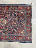 Medallion within medallion antique Persian Tabriz rug with detailed spandrels.