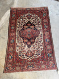 Hand knotted antique Persian Ferahan rug with naturally aged vegetable dyed colors.