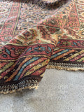 Antique Persian wool runner, 1920s Bakhtiari hand knotted rug featuring intricate lattice motifs, ivory border details, and durable low pile construction.