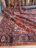 Antique Persian Heriz Rug 8x11 hand knotted with geometric medallion, vegetable-dyed wool, and rich brick red and navy colors.