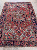 Geometric medallion Persian rug overhead layout view capturing full tribal art design and balanced proportions.