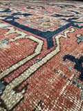 Vegetable dyed wool color variation and texture in antique Persian Heriz rug.