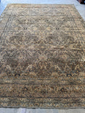 Full view of antique Persian Lavar rug in soft neutral tones.