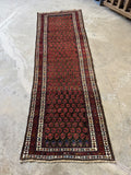 Late 19th century handwoven Kurdish runner with small scale linear pattern.