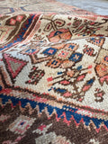 Soft-toned Persian runner with secured edges and excellent.condition