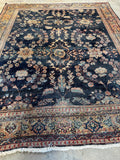 Early 1900s Persian Mahal rug featuring linear floral design.