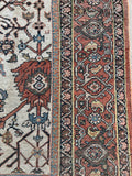 Vintage Persian Mahal rug, 9' x 12'10, ivory field with exceptional vegetable dyed blues, hand knotted antique wool rug in good condition.