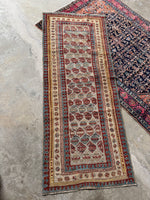 Antique Persian Mahal runner from the 1920s, handwoven with vegetable-dyed wool.