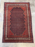 1920s Persian Malayer rug with hand knotted vegetable dyed wool and village tribal design.