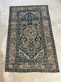 Vintage Persian rug, Malayer origin, with balanced medallion layout.