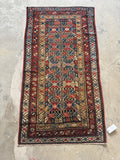 3x6 oriental hand knotted wool rug.