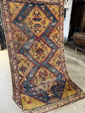 Antique Persian rug with a rare golden yellow ground and three large aqua blue pole medallions.