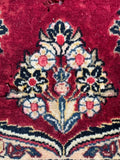 Traditional Persian Sarouk rug floral close up photo of floral design.