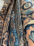 Handwoven Persian rug with bold color contrast and old world wool character.