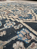 Hand-knotted Persian Malayer rug, low pile, in great condition.