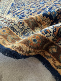 Condition detail of antique Persian rug showing low wear and strong wool pile.