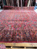 Rare square antique Persian rug with floral design