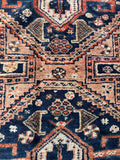 Close-up of rust and navy color variation in the wool.