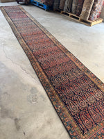 Skinny vintage runner with handwoven floral paisley details.