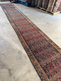 Skinny vintage runner with handwoven floral paisley details.