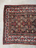 Antique Persian runner color variation showing natural vegetable dyed wool.