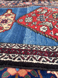 Narrow blue Persian runner for a hallway, galley kitchen or busy passageway.
