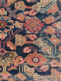 Distressed Persian kitchen runner styled to highlight its faded elegance and durable hand-knotted construction.