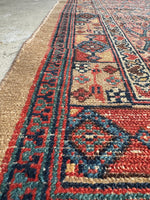 Antique narrow Seraband rug with fully secured hand bound sides.