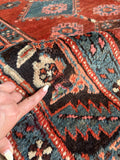 Small patch within border band of antique tribal runner from the Caucasus mountain region.