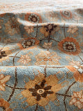 Low original wool pile on a handmade antique 7x10 Persian Tabriz rug.
