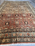 Tabriz rug showing dye batch color variation.