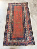 Heavily worn antique Persian floor rug with an authentic, time-worn patina and organic vegetable dyes.