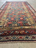 3x6 low pile Persian rug.