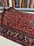 Tabriz rug with crisp lines and natural dye variation.