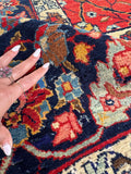 Close-up of vegetable-dyed wool in a 1920s antique Tabriz rug.