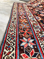 Border section with multicolored eight-pointed stars symbolizing happiness and fertility