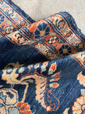 Antique Lilihan runner showing vegetable dyed wool and floral design.