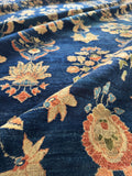 Antique Persian Sarouk rug with natural dyes and luminous wool surface.
