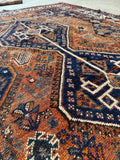 Antique shabby chic Shiraz rug with floral motifs and soft worn texture.