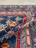 Luminous wool Caucasian rug with natural sheen and glow.