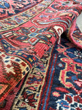 Persian Heriz rug low pile vegetable dyed wool texture.