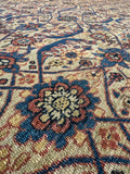 Close-up of a patterned rug with intricate designs.