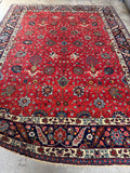 Large 9’3 x 12’6 Persian rug with rich color and pattern.