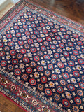 Fine woven Persian rug highlighting precision knotting and lattice artwork.