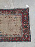Antique Persian Caucasian runner, hand knotted vintage wool rug with a distressed ivory field, tribal geometric artwork, and vegetable dyed colors.