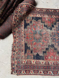 5x6 handmade Persian Afshar rug featuring traditional tribal motifs and faded navy ground.