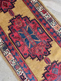 Vintage long Persian runner rug. Gold field red medallions. 3x15.